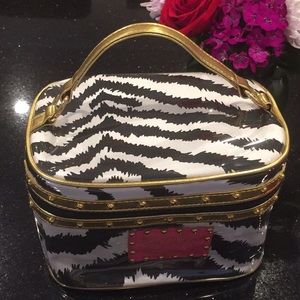 Betsey Johnson Soft Train Cosmetic Case.